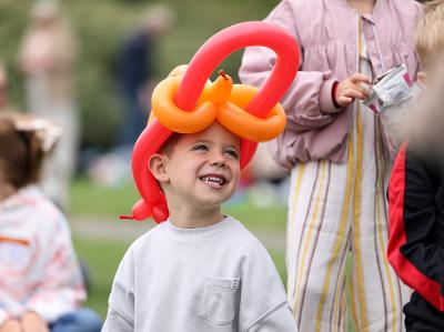 picture of a boy with a balloon model at Stockton on Tees Council foster carer summer party