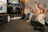Foster carers Lee and Kylie gaming with their children